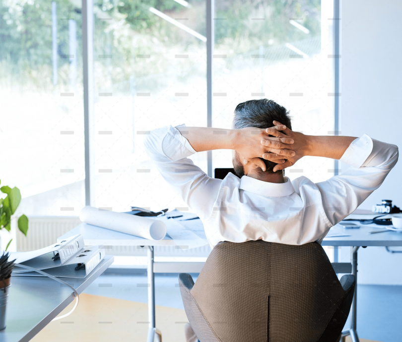 demo-attachment-477-Businessman-at-the-desk-in-his-office-resting.