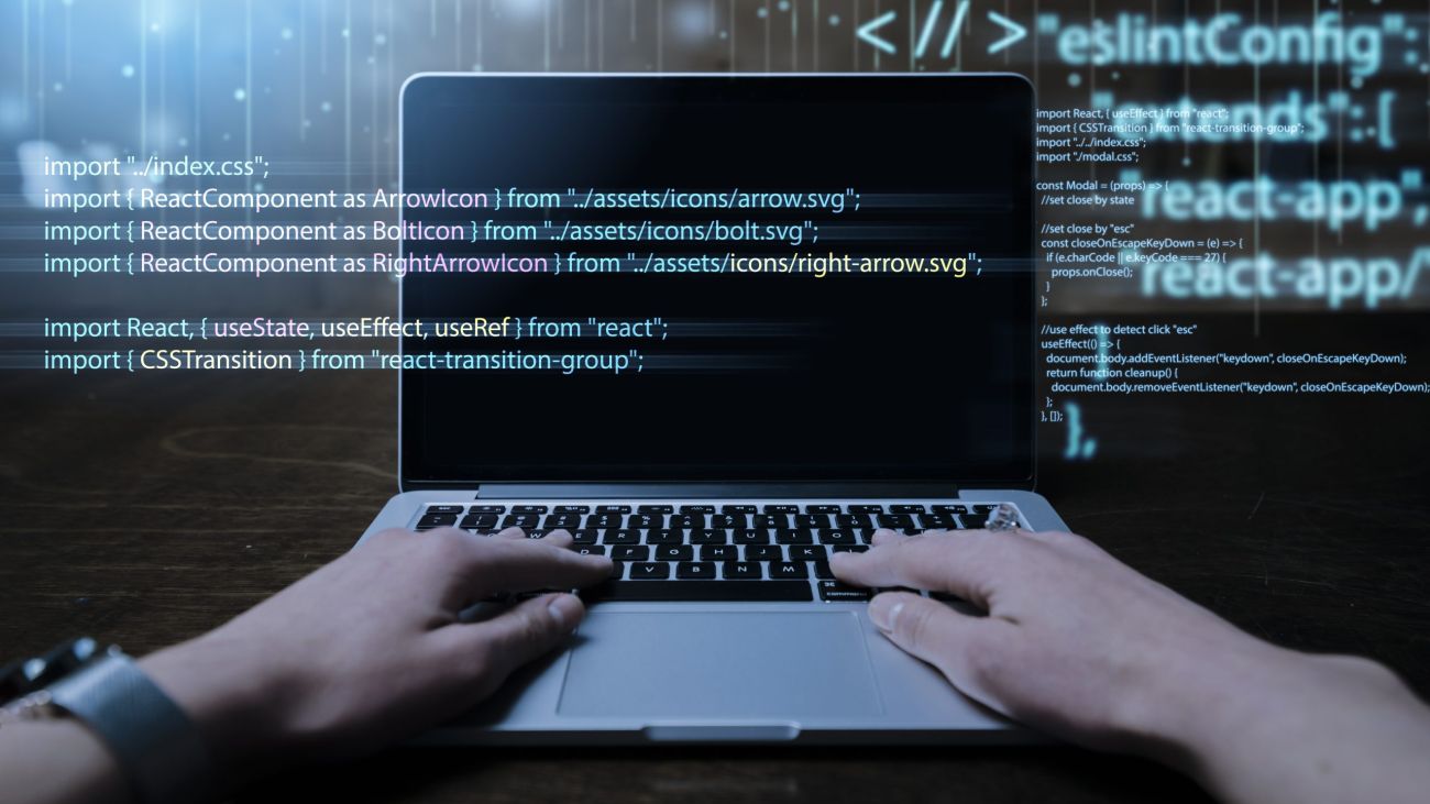 programming-background-with-person-working-with-codes-computer